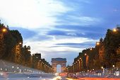 foto of france  - Beautiful night view with car traffic and rush at eavning of the Arc de Triomphe - JPG 