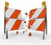 stock photo of break  - A roadblock barrier or barricade is split as you break through to freedom - JPG 