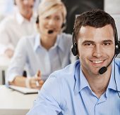 picture of customer  - Young customer service operator talking on headset - JPG 