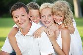 foto of family  - Family in summer park - JPG 
