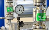 foto of industrial  - new shiny industrial thermometer in boiler room - JPG 