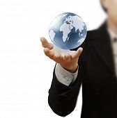 stock photo of globe  - holding a glowing earth globe in his hands - JPG 