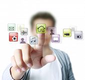 picture of future technology  - hand pushing on a touch screen interface - JPG 