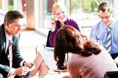 picture of meeting  - Business people having meeting or workshop in office - JPG 