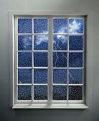 foto of windows  - Modern residential window with lightning and rain behind  - JPG 