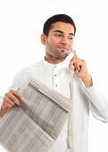 stock photo of newspaper  - An ethnic mixed race man on a telephone call - JPG 