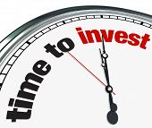 stock photo of investment  - An ornate clock with the words Time to Invest on its face - JPG 