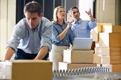 stock photo of meeting  - Workers In Distribution Warehouse - JPG 