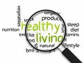 image of magnifying  - Magnified Healthy Living word illustration on white background - JPG 