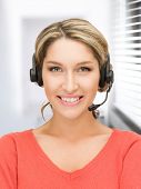 foto of helpline  - bright picture of friendly female helpline operator - JPG 