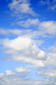 picture of blue sky  - White fluffy clouds in blue sky - JPG 