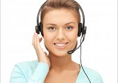 stock photo of helpline  - bright picture of friendly female helpline operator - JPG 