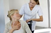 pic of home  - Nurse at home with elderly person in wheelchair - JPG 