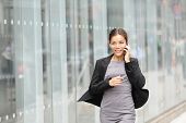 pic of finance  - Business woman in motion - JPG 
