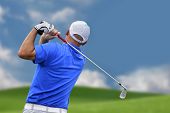 stock photo of golf  - Photo of golfer shooting a golf ball - JPG 