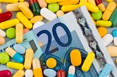 image of health  - euro banknotes and pills - JPG 