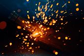 artistic welding sparks light, industrial background