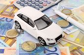 image of finance  - A luxury car finance metaphor in Euro money - JPG 