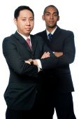 foto of business people  - Two young businessmen standing against white background - JPG 
