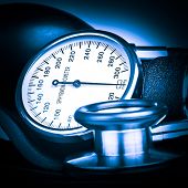 image of pressure  - Blue toned sphygmomanometer and stethoscope kit used to measure blood pressure - JPG 