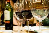image of restaurant  - Four glasses of wine set in the restaurant - JPG 