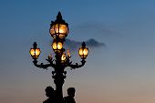 picture of france  - Streetlamp in the bridge Alexander III Paris Ile de France France - JPG 
