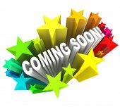 picture of future  - The words Coming Soon shooting out at you in 3D surrounded by stars and fireworks in anticipation of the grand opening of a new store or road or other project - JPG 