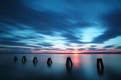 pic of sunset  - Ocean Sunset with blue clouds and water - JPG 