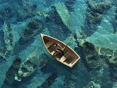 foto of boat  - boat sails through the graveyard of sunken boats - JPG 