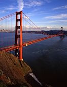 stock photo of golden gate bridge  - an evening image of the golden gate bridge with san francisco in the background - JPG 