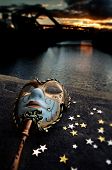 stock photo of bridge  - Venetian Mask by the River Bridge with Sunset - JPG 