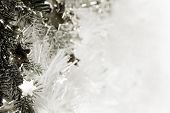 pic of glisten  - Silver sparkling stars on a white glistening background - JPG 