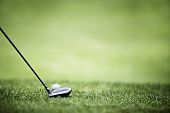 foto of golf  - Golf ball behind driver at driving range - JPG 