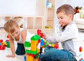 pic of construction  - Children Boys playing with construction set on the floor - JPG 
