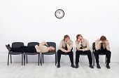 image of wait  - Bored stressed and exhausted people sitting on chairs waiting - JPG 