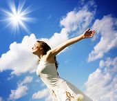 pic of blue sky  - Beautiful Young Woman over blue Sky - JPG 
