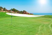 stock photo of golf  - Golf course on the background of the sea. Summer.
** Note: Shallow depth of field - JPG 