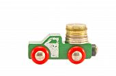stock photo of money  - vintage wodoen truck toy and money coins concept - JPG 