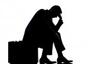picture of one  - one caucasian business man sitting on suitcase tired despair silhouette Full length in studio isolated on white background - JPG 
