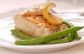 stock photo of construction worker  - Fresh sauteed cod fillet with green beans and lemon - JPG 