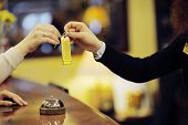 picture of receptionist  - business woman  at the reception of a hotel checking in - JPG 