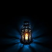 picture of symbols  - An illuminated Arabic lantern on back background - JPG 