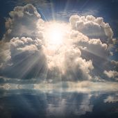 foto of nature  - The sun on dramatic sky over sea - JPG 