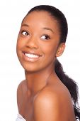 stock photo of woman  - Portrait of a young beautiful african woman Isolated over white background - JPG 