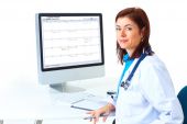 picture of medical doctors  - Smiling medical doctor woman with computer - JPG 