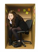 stock photo of business people  - Deppressed woman in a Cardboard Box office - JPG 