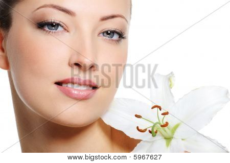Picture or Photo of Fresh clear healthy skin on the face of beautiful woman over white background
