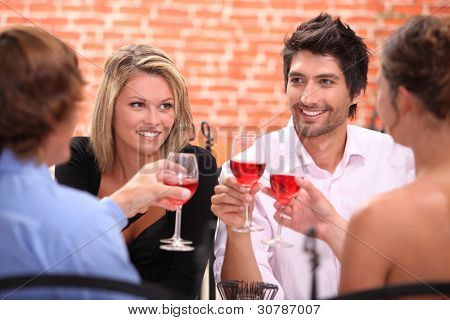 Picture or Photo of Two couple at a restaurant