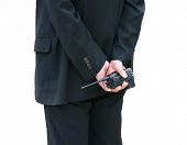 image of security  - Security Personnel isolated on white holding a radio - JPG 