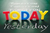 picture of yesterday  - Today yesterday and tomorrow words on blackboard Time concept - JPG 